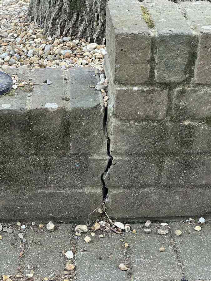 Vertical settlement crack in a concrete foundation wall