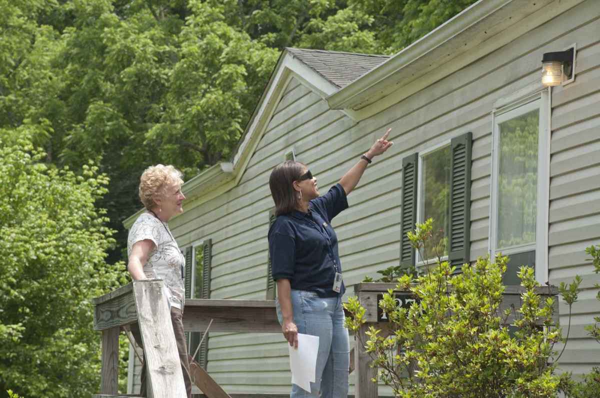 Inspector examining a home for foundation problems